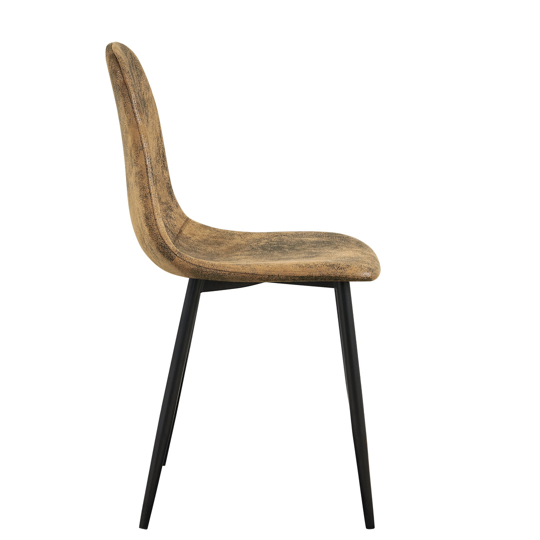 Set of four tan faux suede dining chairs with black metal legs. Curved shell supports the back and a slim frame saves space for kitchens, dining rooms, and apartments.